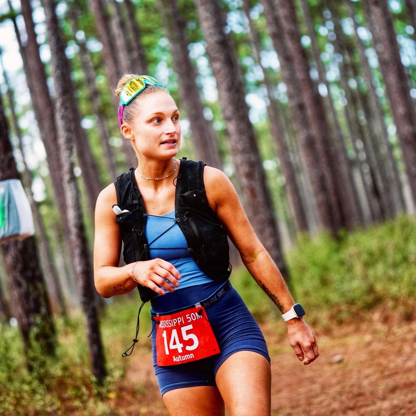 Running through the pine forest at Mississippi Trail 50